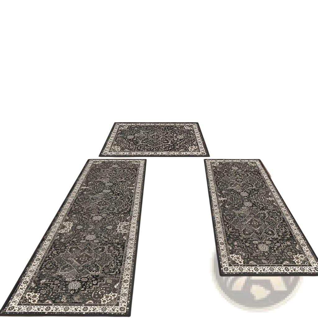 Three dark gray washable boho kitchen rugs with intricate white floral patterns and non slip backing on kitchen floor