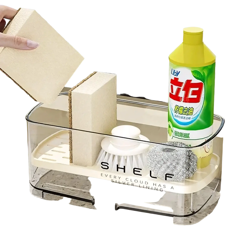 Clear plastic kitchen sink organizer and drain rack with beige interior featuring shelf branding