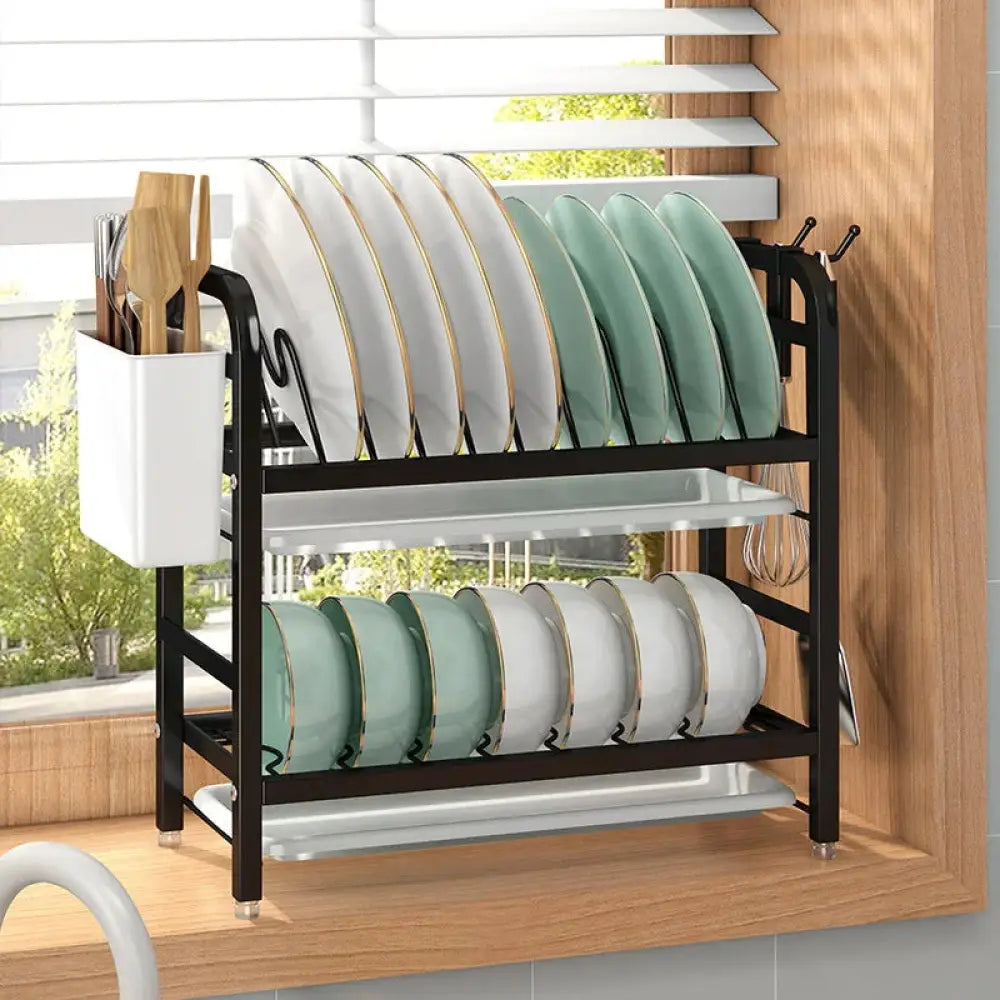 Black metal two tier kitchen dish drying rack with white plastic side compartment and silver tray bases for organization