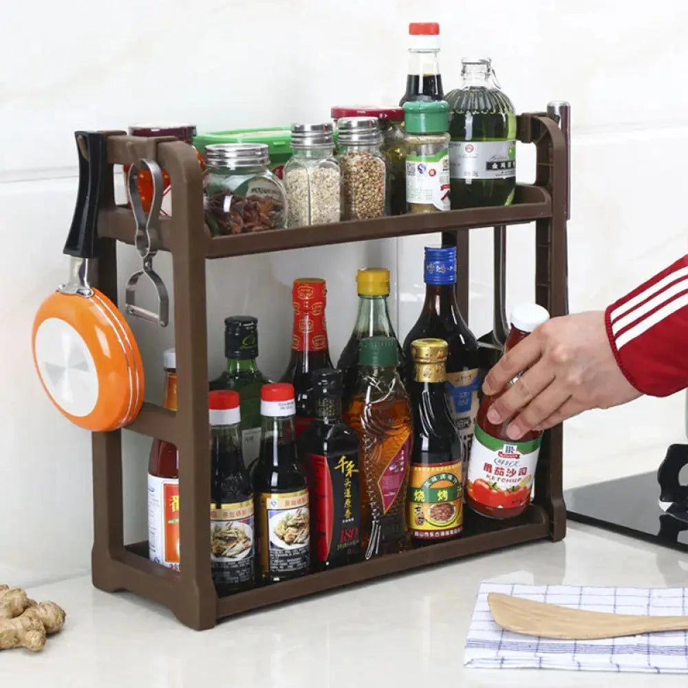 Brown multilayer two tier plastic kitchen spice and utensil organizer rack with hanging pot holder and bottle hooks