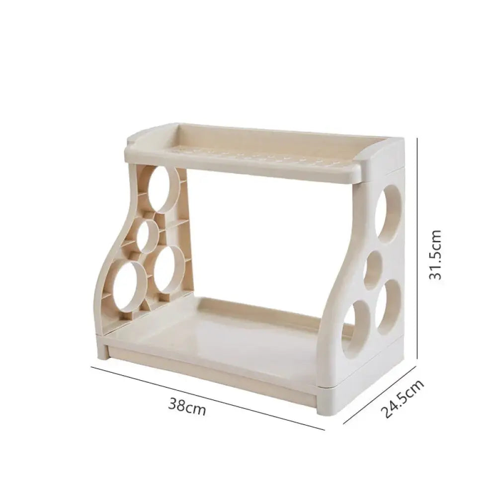 Beige two-tier plastic kitchen spice and utensil organizer rack with circular cutouts on the sides