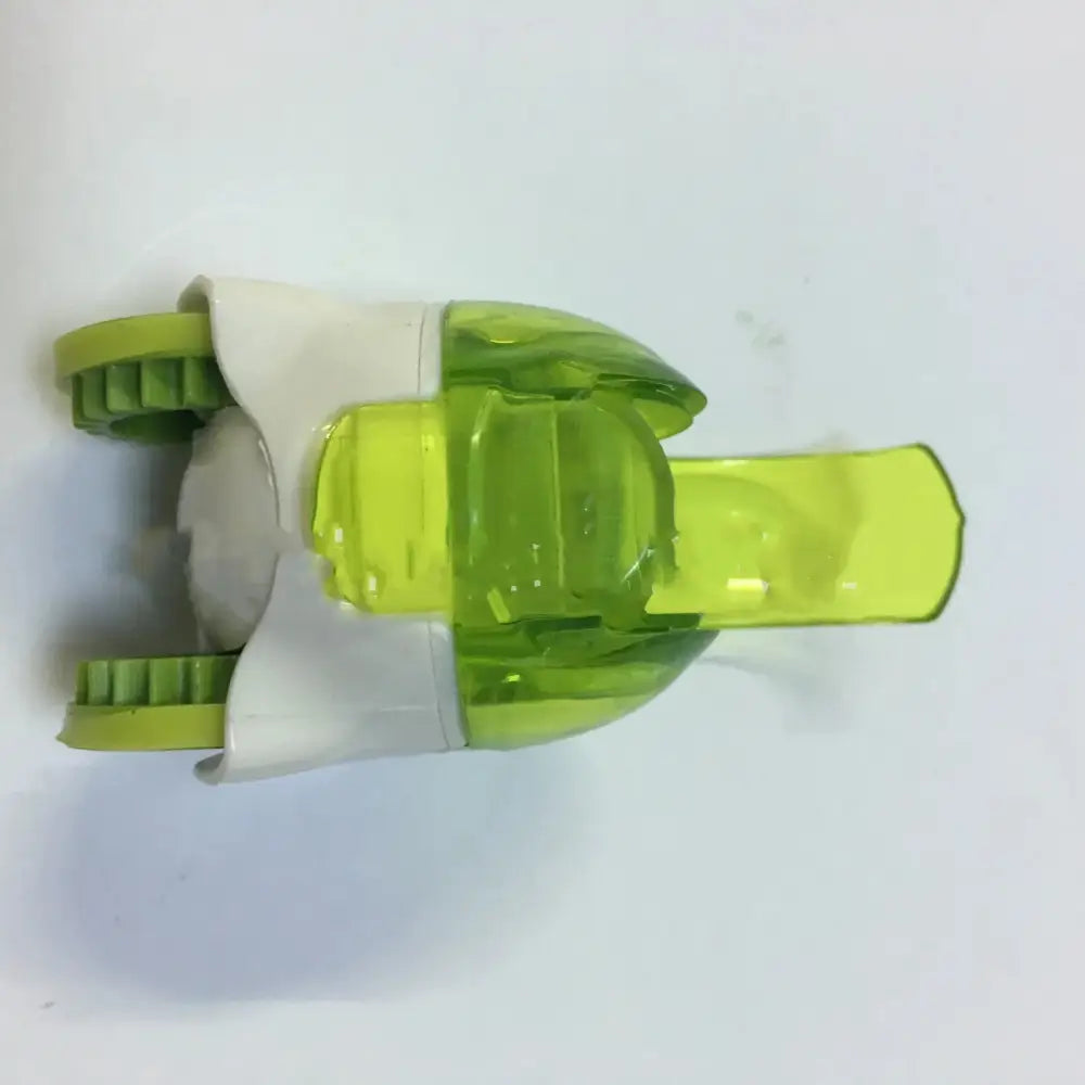 Ergonomic clear garlic press and mincer with precision blades featuring a transparent lime-green body and textured grips