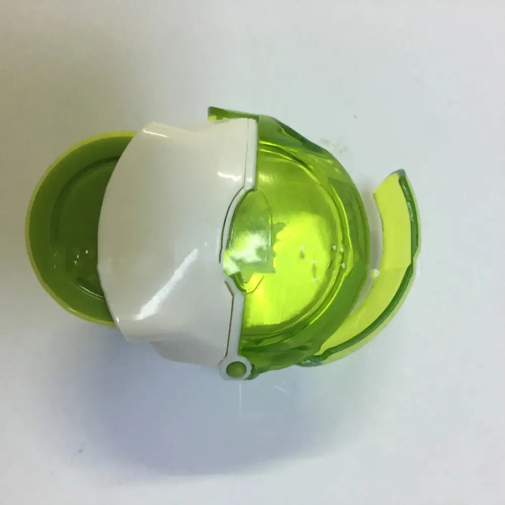 Ergonomic clear garlic press and mincer with precision blades in translucent lime green and white plastic with glossy panels