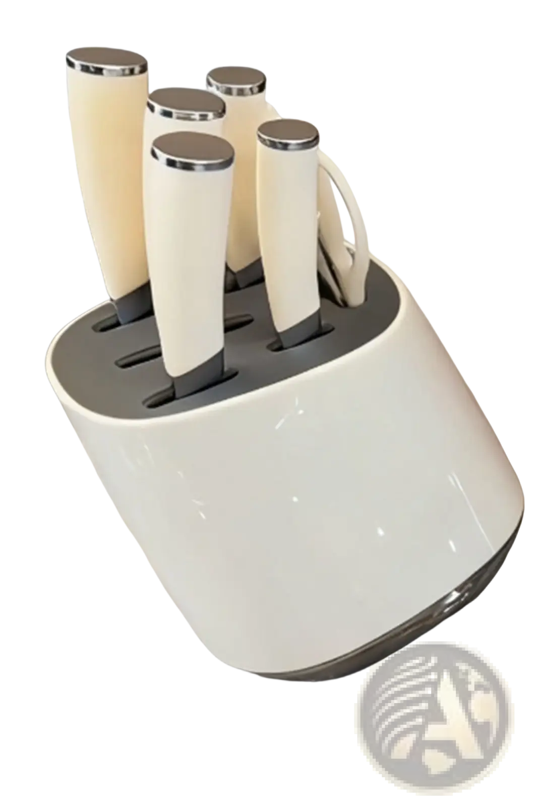 Cream-colored ceramic knife block with silver metal accents holding five modern stainless steel kitchen knives