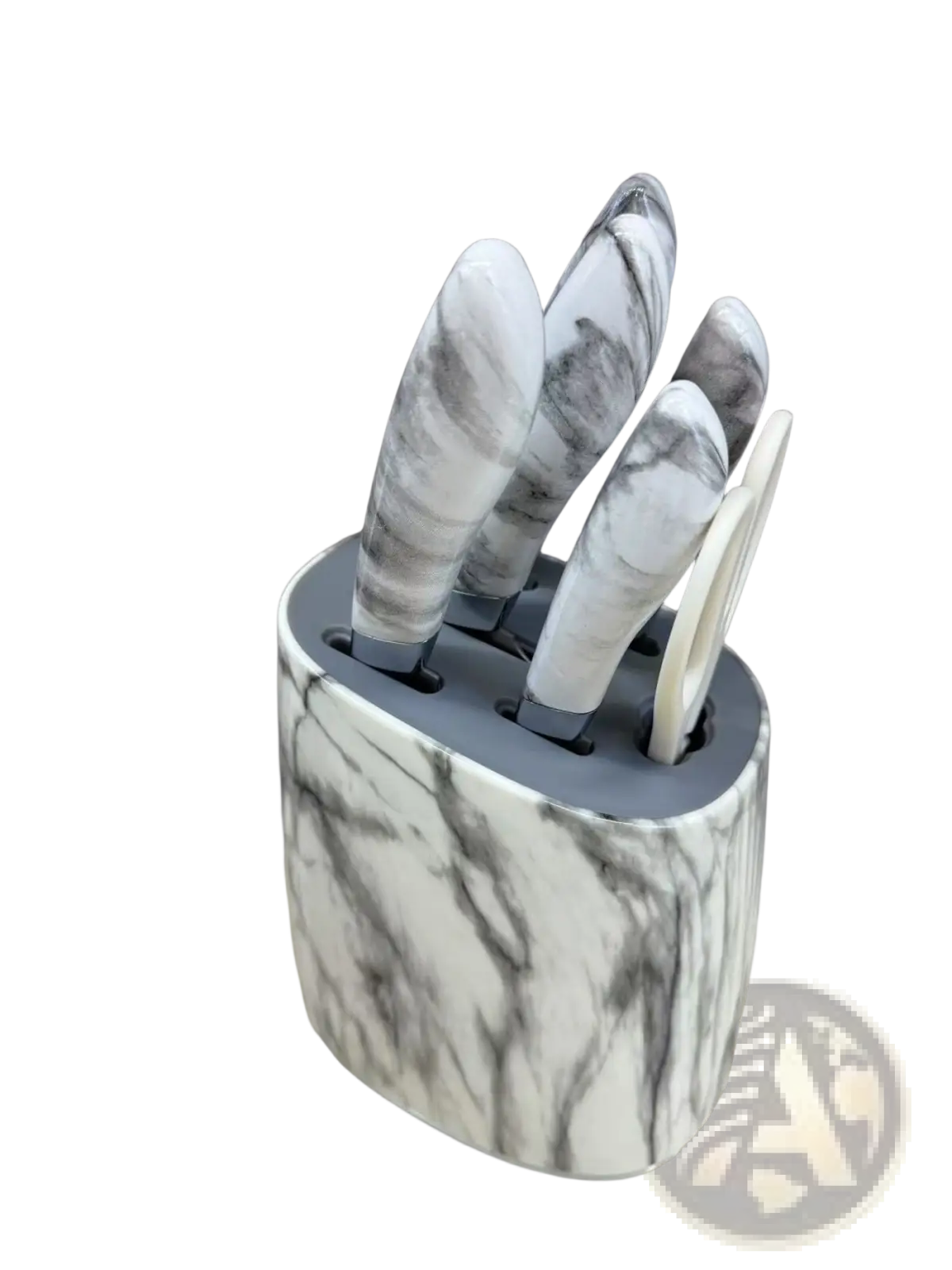 White and gray marble-patterned knife block with matching handles holding kitchenware knife set with stainless steel blades
