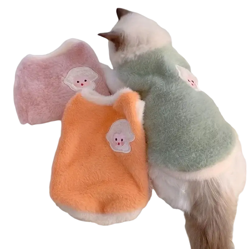Soft pink orange and mint green fuzzy cat vests with white cloud face appliqués for kittens clothes and cats accessories