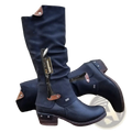 Dark blue knee high suede leather boots with brown accents and side zipper featuring a block heel design