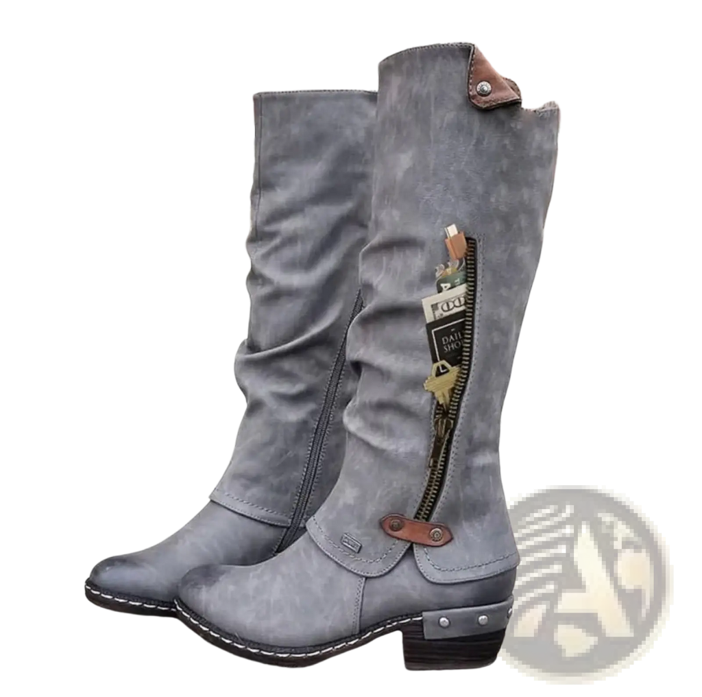 Gray suede knee high boots with brown leather accents and a low block heel for stylish wear