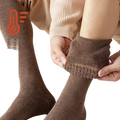 Brown knitted knee long socks with ribbed cuff textured weave made of long socks wool for warm longer stocking use