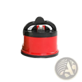 Red and black handheld knife sharpener with suction safety tool and ergonomic handle for kitchen chef knives