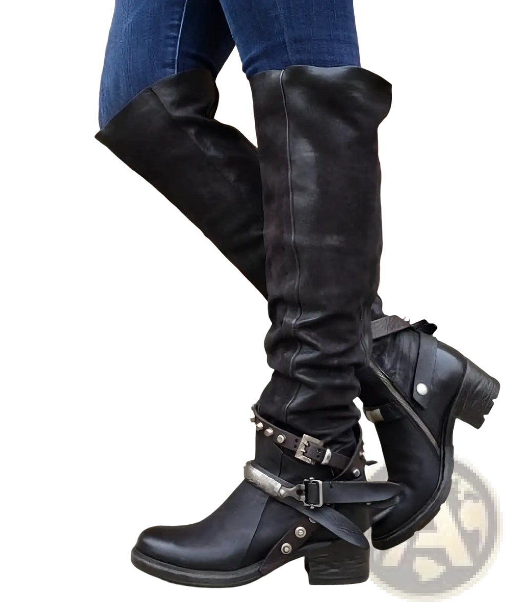 Black leather over-the-knee knight boots with studded buckle straps and chunky heels in suede material