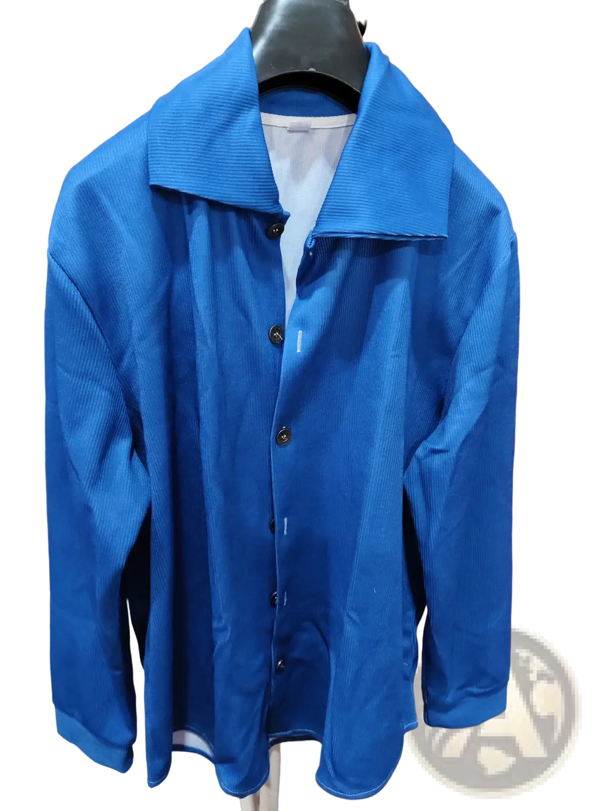 A vibrant royal blue corduroy button-up shirt with structured collar and matching buttons for casual wear