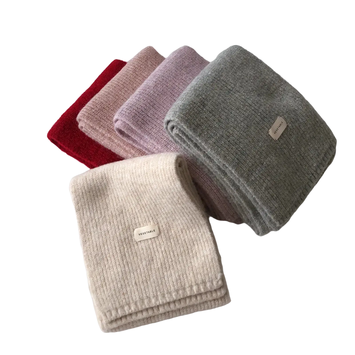 A collection of five folded ribbed knit cashmere scarves for women in red pink lavender gray and beige winter colors