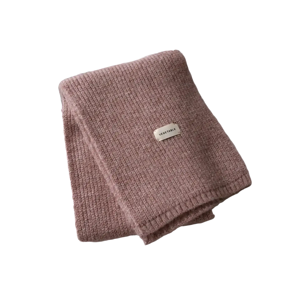 A soft dusty rose knitted cashmere winter scarf for women with ribbed texture and vegetable label near the fold