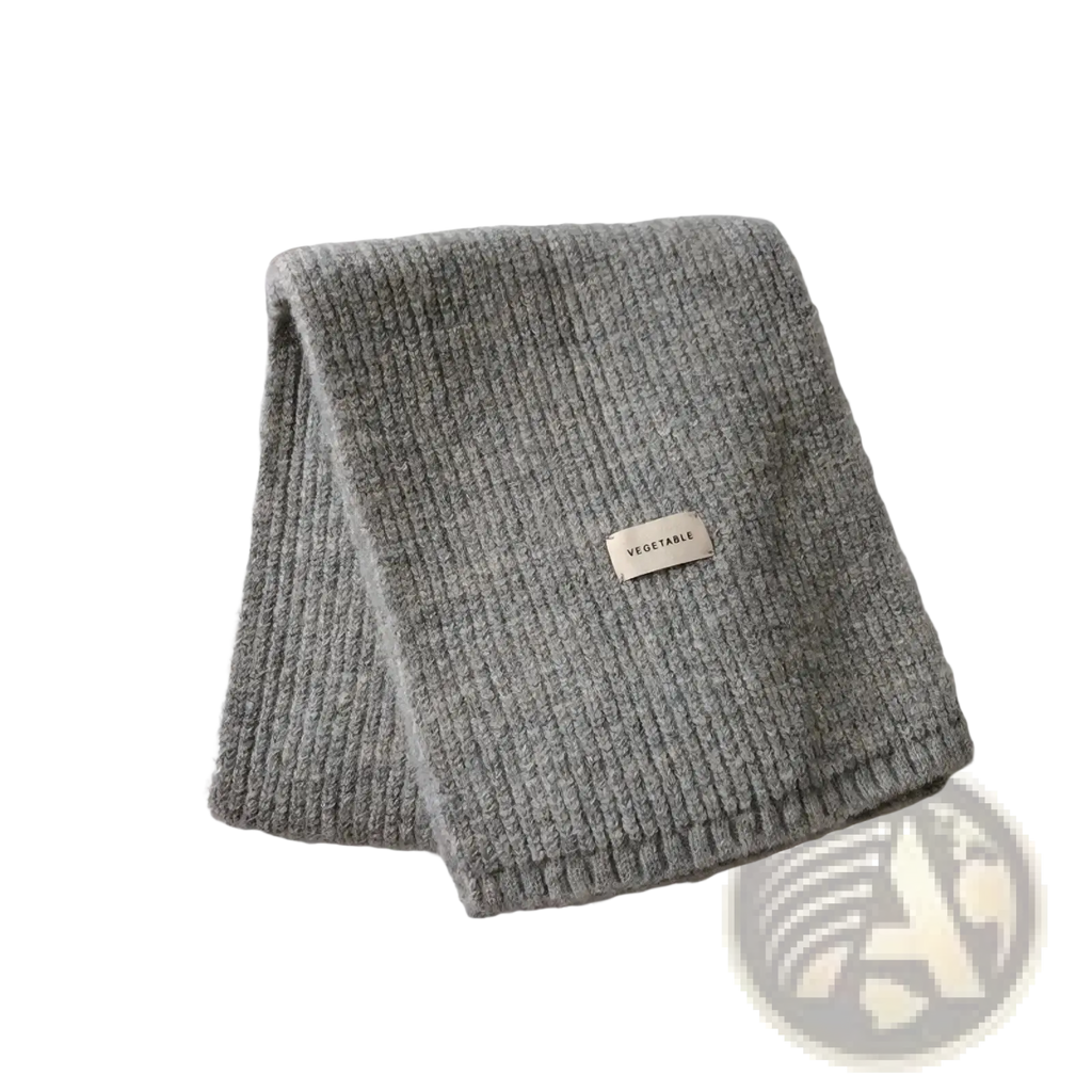 Heather gray ribbed knit cashmere winter scarf for women with small vegetable label near the fold