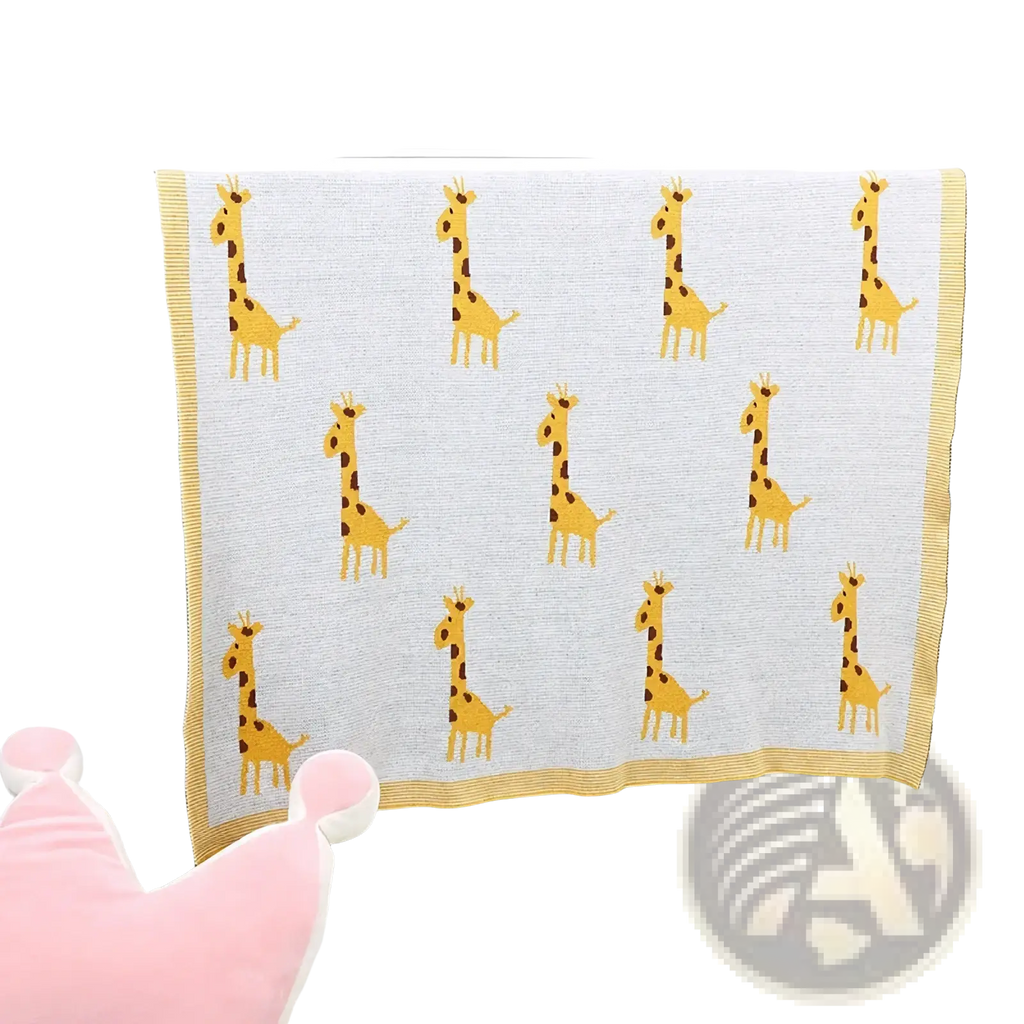 Knitted cotton giraffe baby blanket in soft light gray with yellow giraffe pattern and solid yellow border