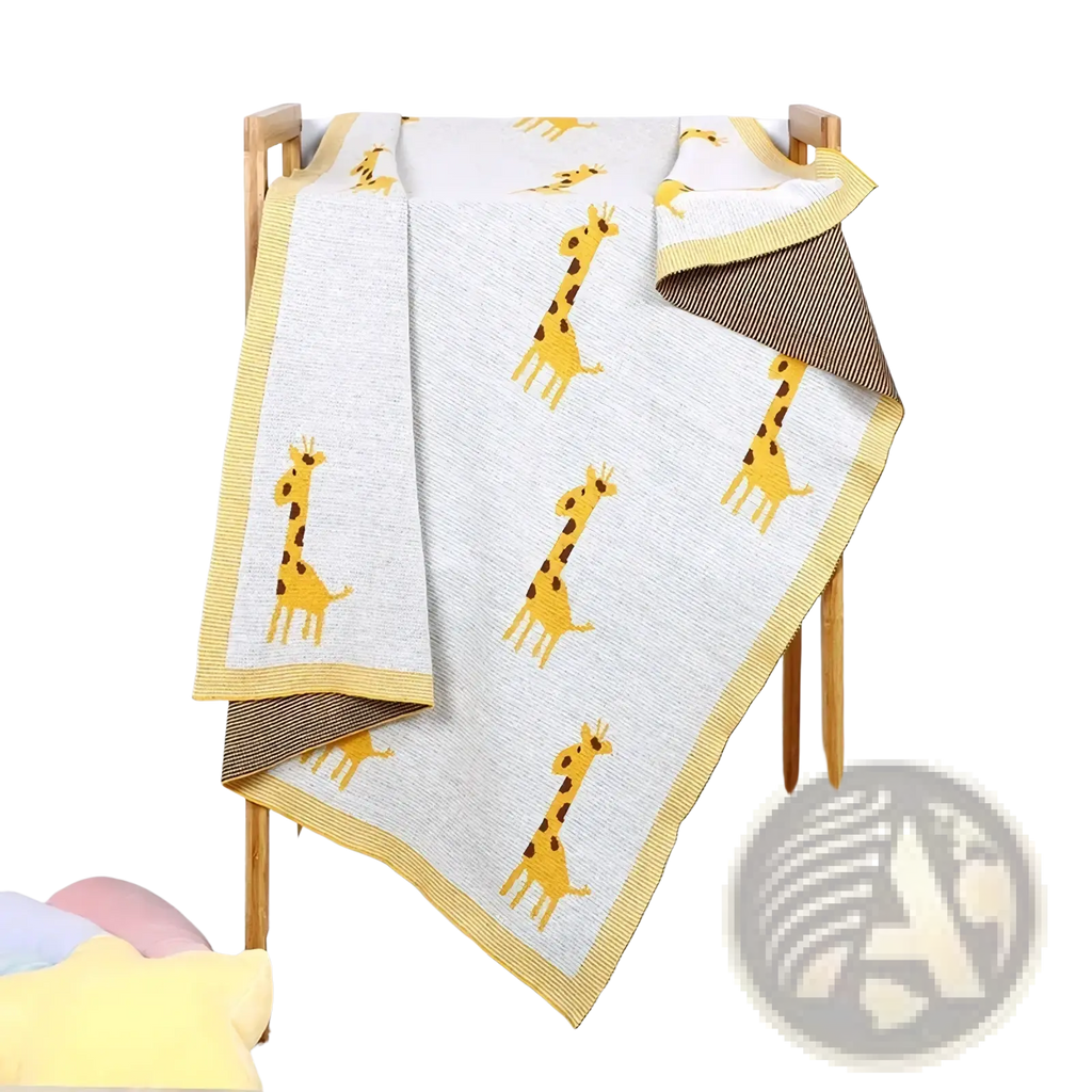 Knitted cotton giraffe baby blanket in soft light gray with yellow giraffe pattern brown spots and bright yellow trim