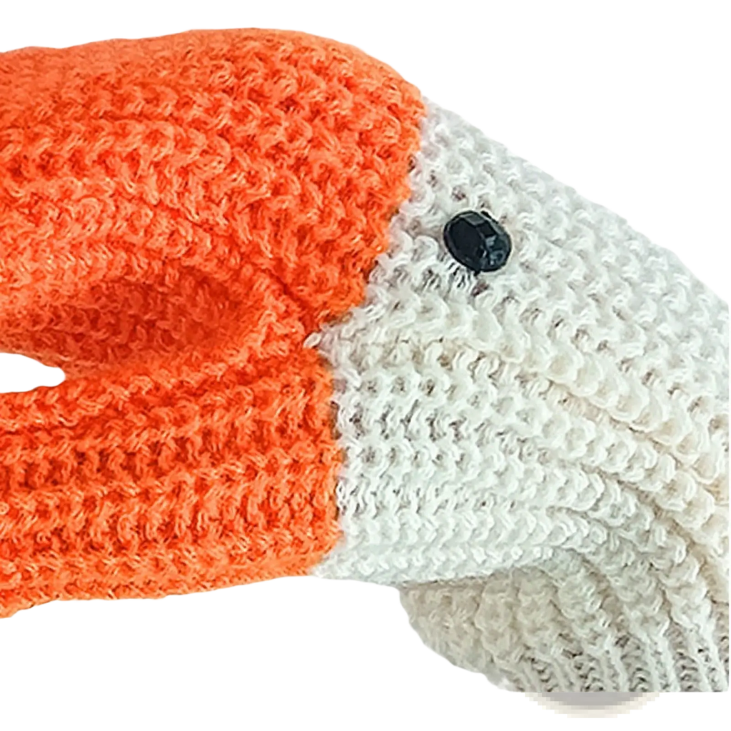 Knitted duck hand puppet winter mittens in orange and white yarn with black button detail for cold weather use