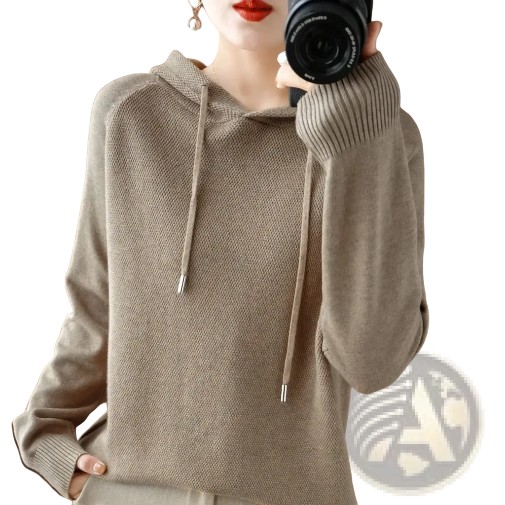 Beige knitted hooded sweatshirt for women featuring textured knit fabric with ribbed cuffs and adjustable drawstrings