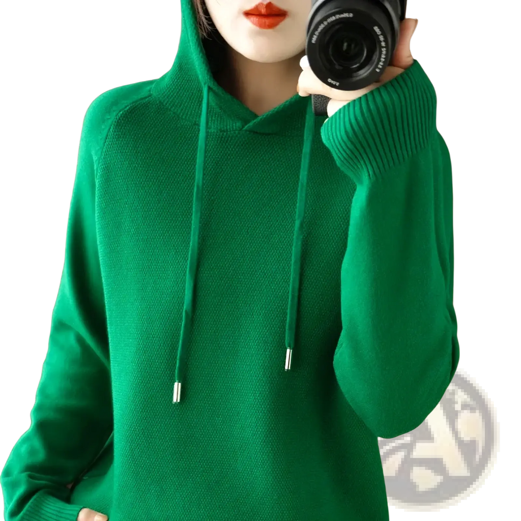 A vibrant green knitted hooded sweatshirt for women with long sleeves ribbed cuffs and silver-tipped drawstrings