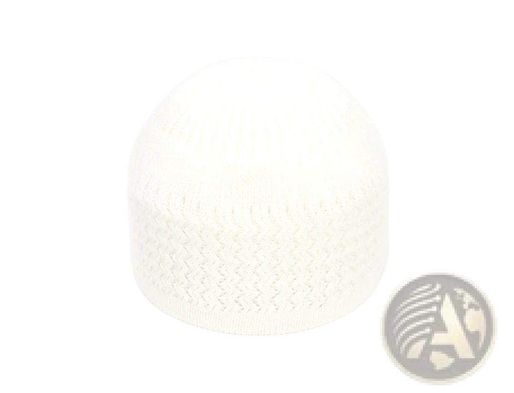 A soft white knitted jacquard winter beanie hat with a textured zigzag pattern along the bottom edge