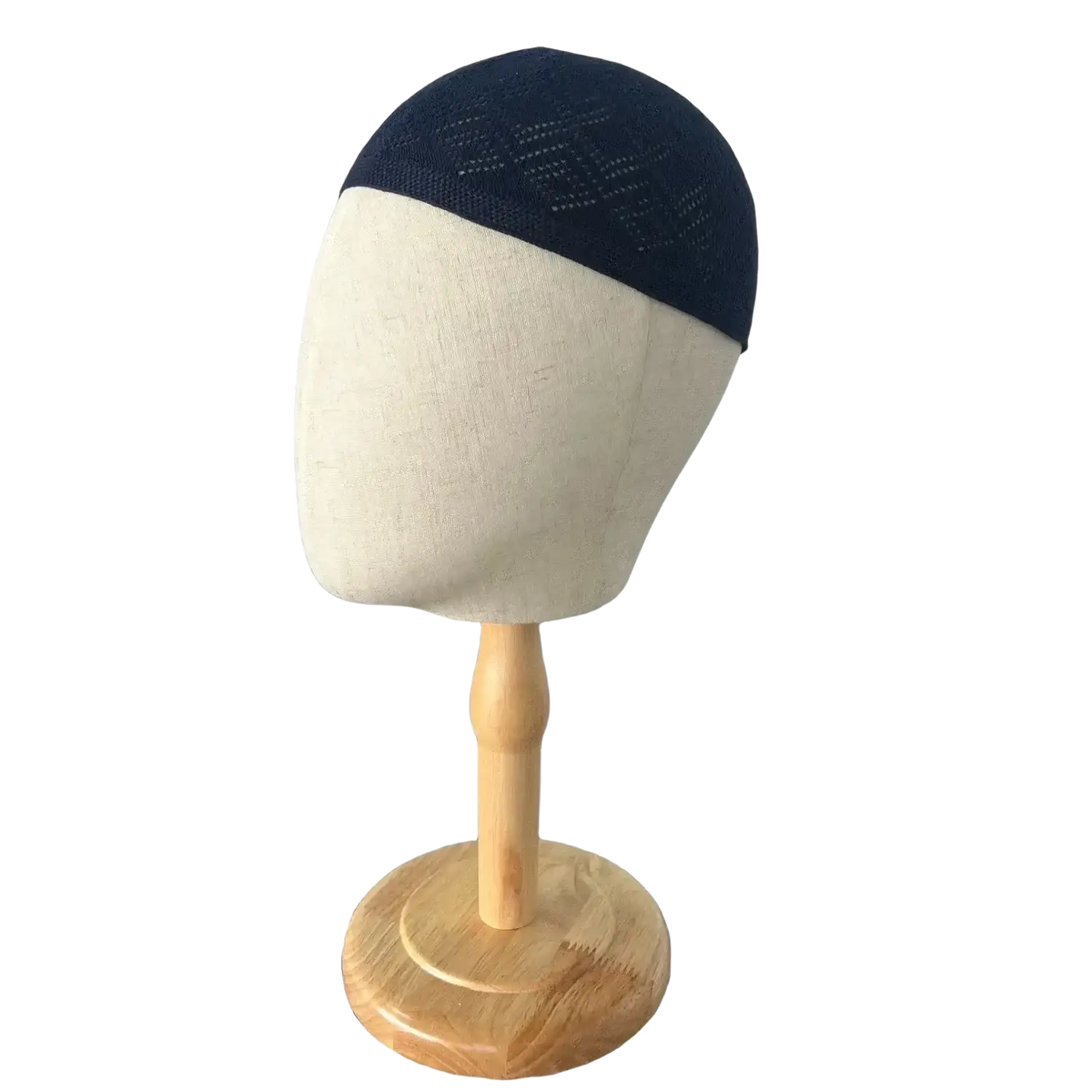 Navy blue knitted kufi beanie prayer cap displayed on wooden mannequin head emphasizing knitted kufi design