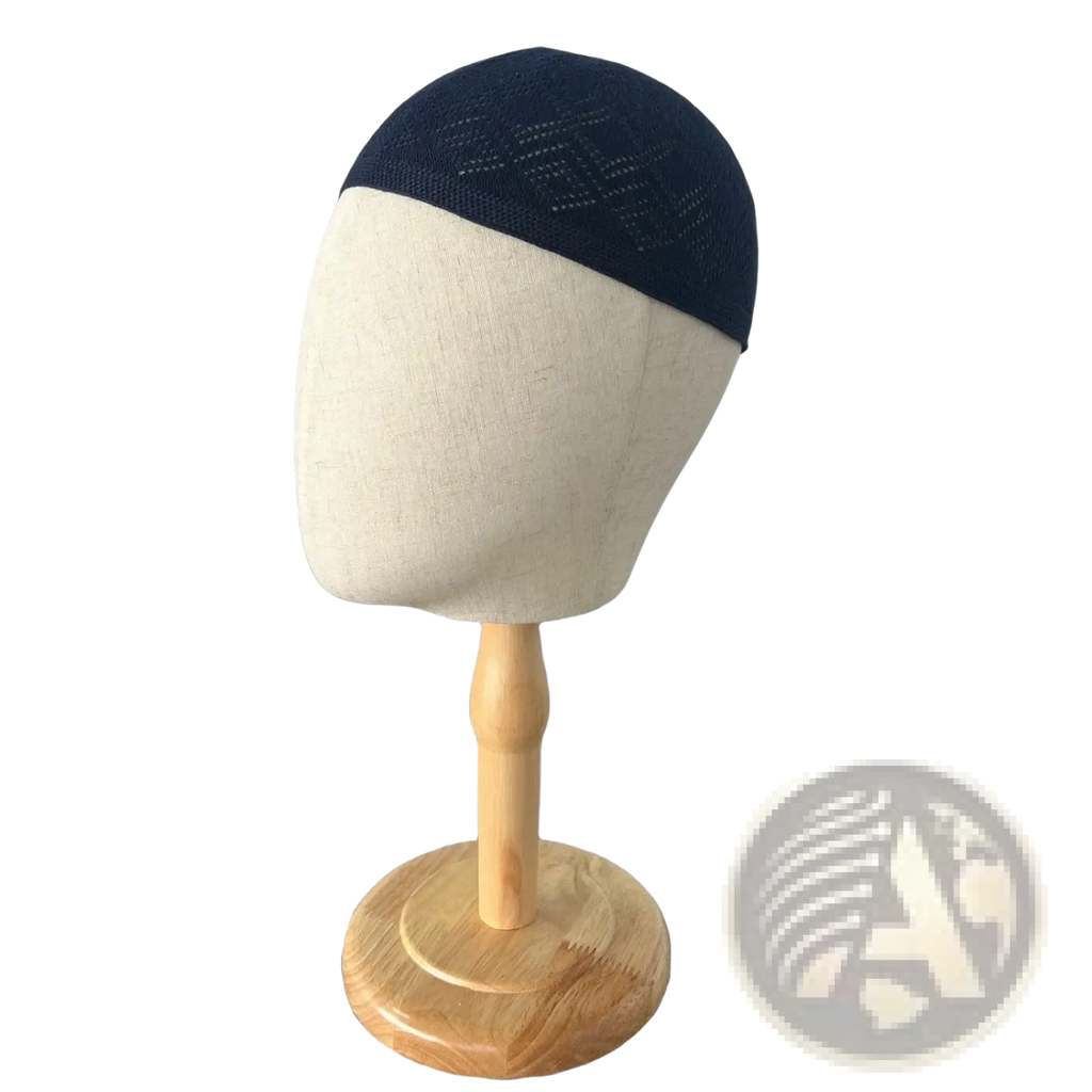 Navy blue knitted kufi beanie prayer cap with subtle diamond pattern made of soft yarn for comfortable wear