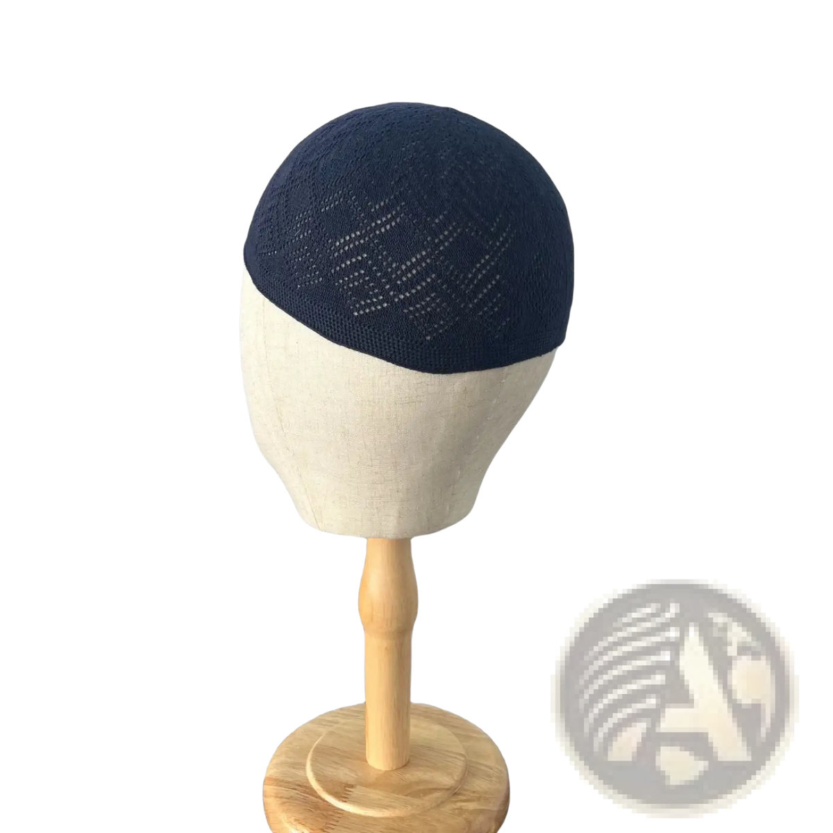 Navy blue knitted kufi beanie prayer cap with a subtle textured pattern made from soft yarn