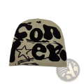 Beige knitted letter jacquard beanie with bold black conex lettering and star graphic warm winter hat