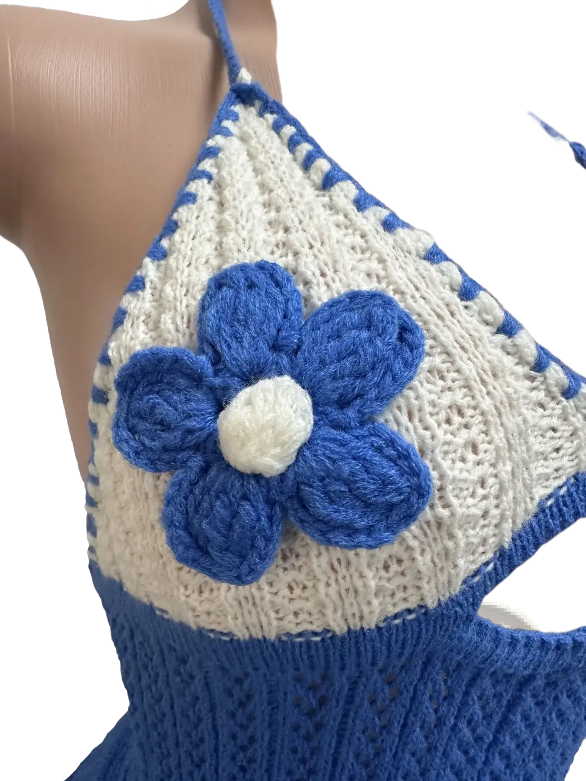 Blue and white crocheted halter top with prominent blue flower appliqué featured in knitted ruffle halter romper summer playsuit