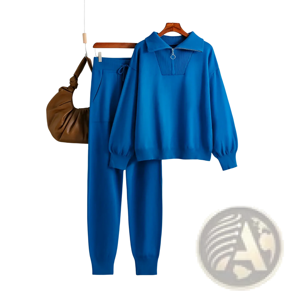 Vibrant royal blue knitted sweatsuit set featuring a collar and zipper detail for comfortable casual wear