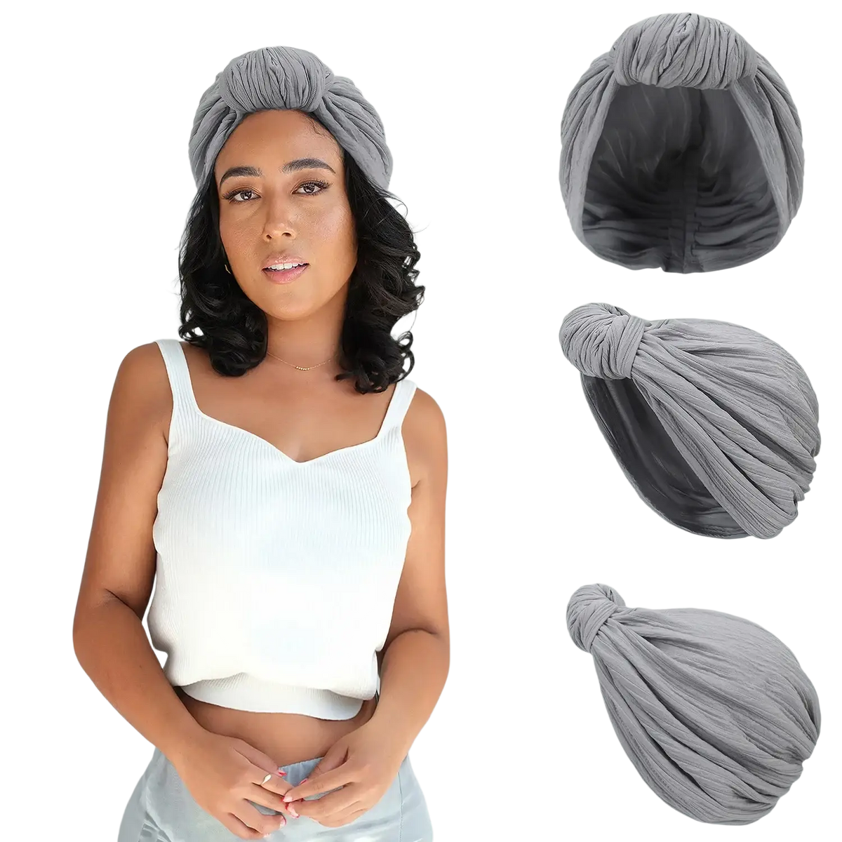 Gray knitted turban cap with twisted fabric and gathered knot featuring a soft textured surface for warm winter wear