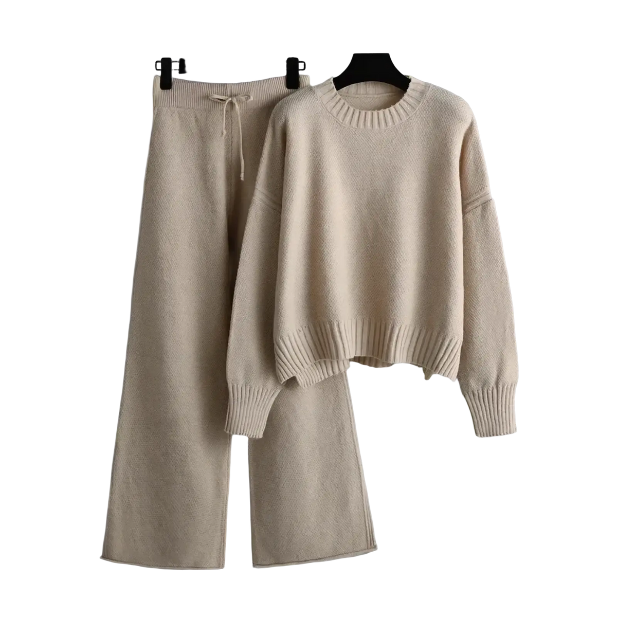 Cream-colored knitted wide leg pants set featuring cozy textured fabric and ribbed cuffs for comfortable wear