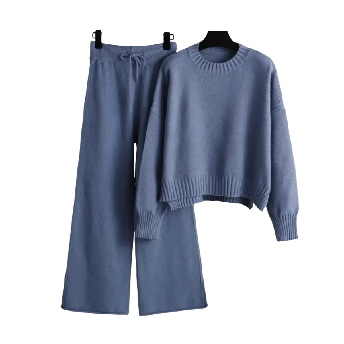 Soft pastel blue knit sweatsuit with ribbed cuffs and hem featuring cozy cropped sweater and wide-leg pants