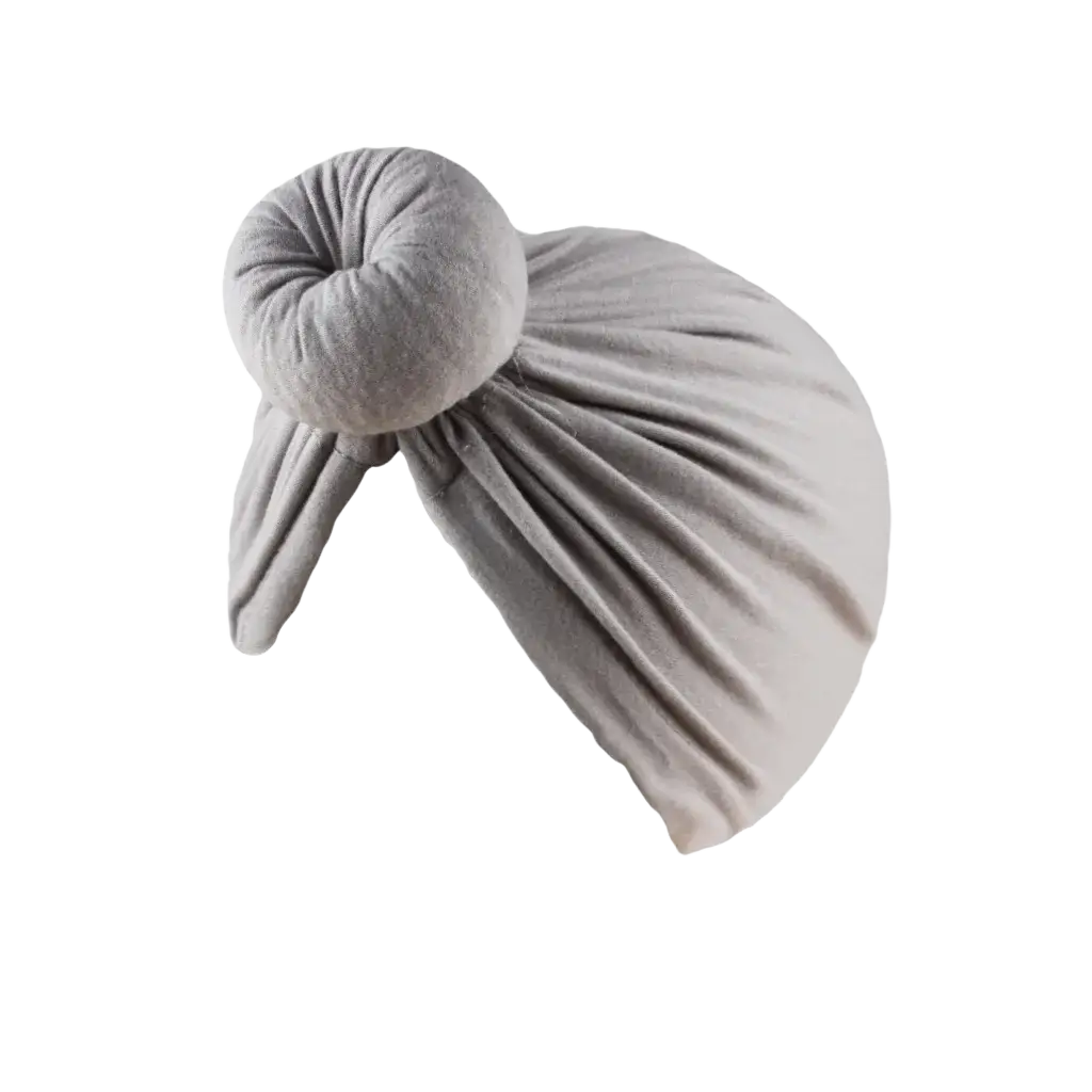 A soft light gray velvet knot turban hat made of cotton for muslim hijab with a gathered knot at the top