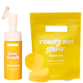 Yellow foam wash bottle with white pump and yellow glow up pads in pouch from kojic acid exfoliating kit with 30 pads