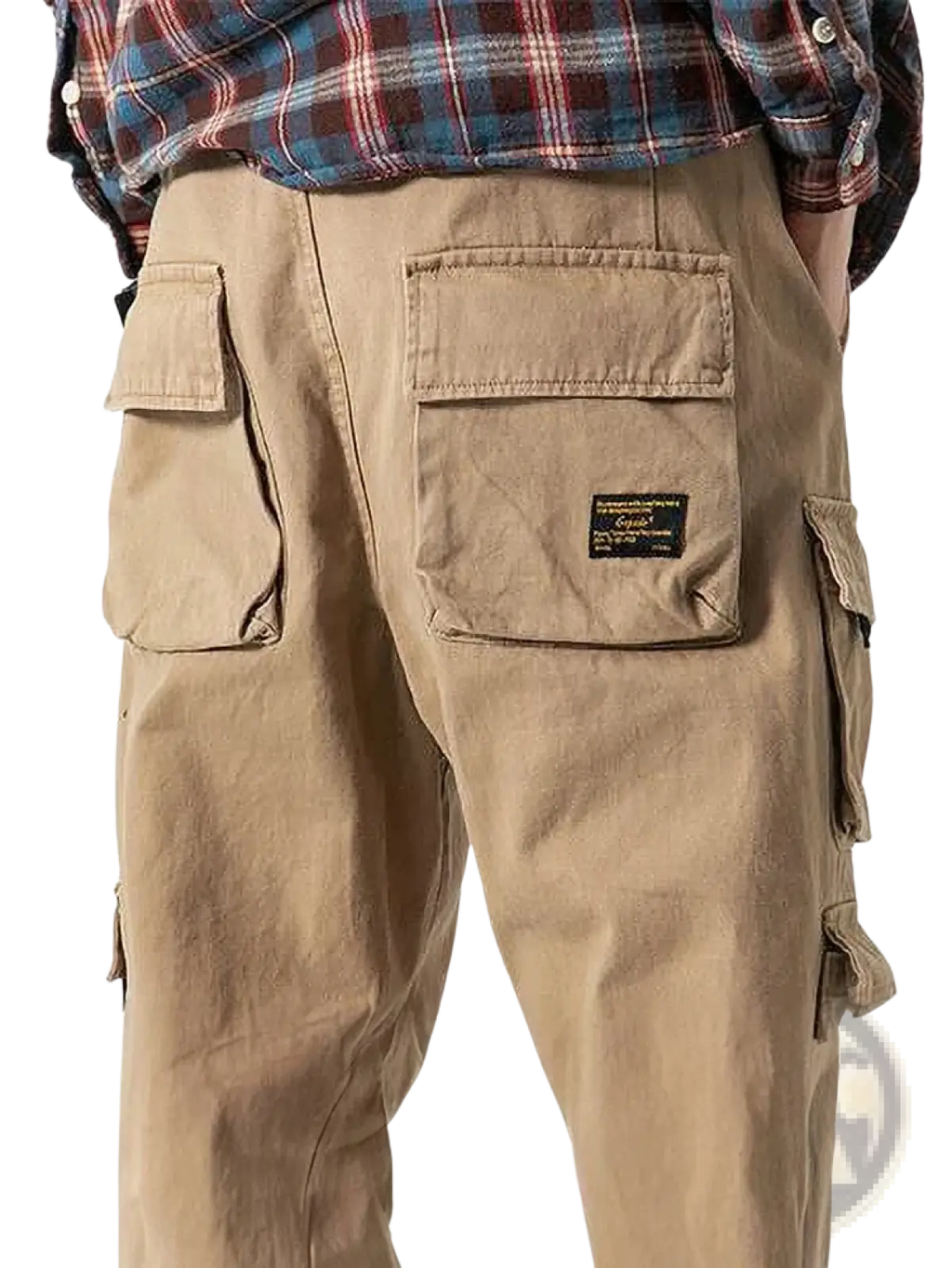 Beige korean cargo jogger pants for men with multiple pockets and black label on the back right pocket seen from back side