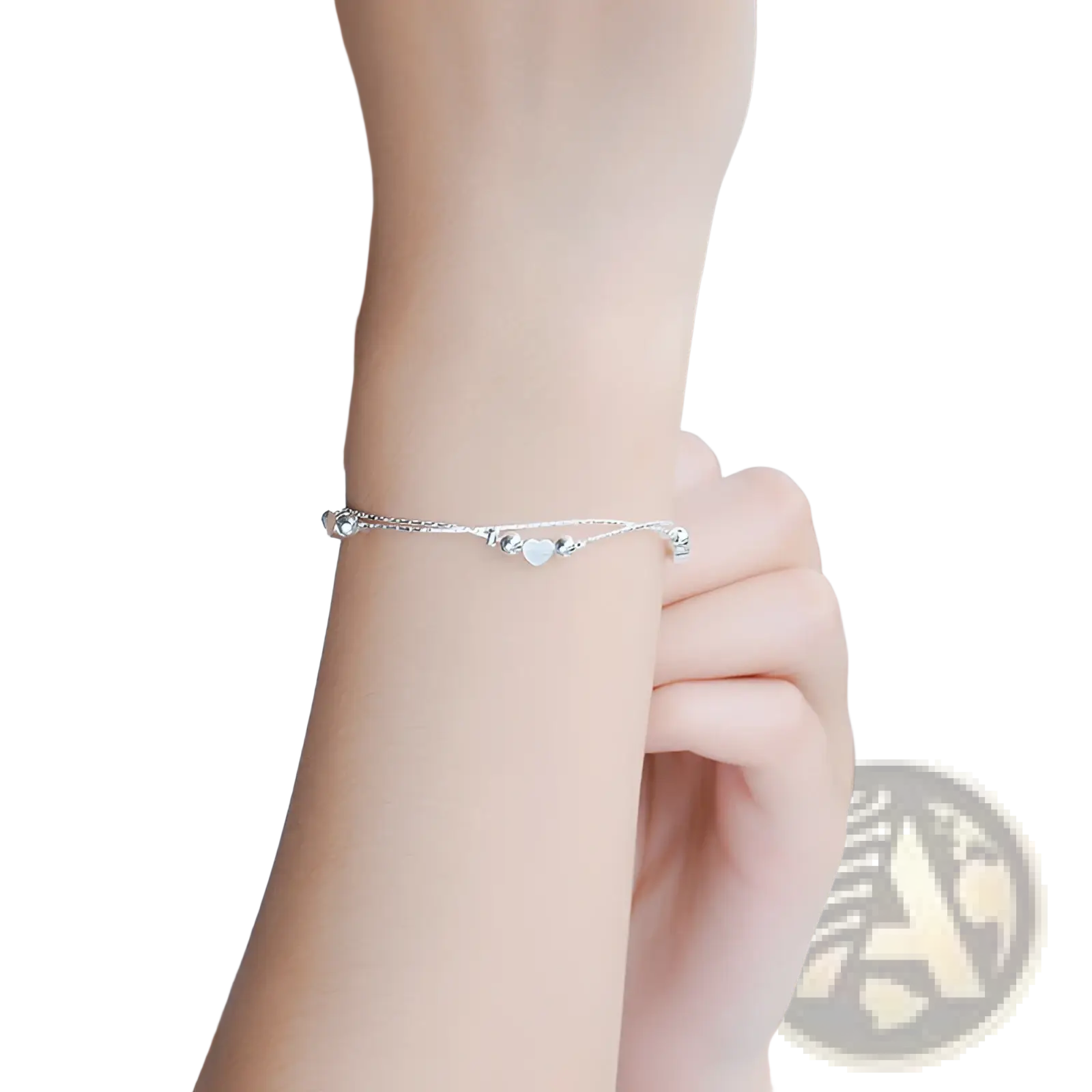 A delicate korean double layer silver heart bead bracelet with fine chain and small spherical silver beads