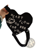 Black heart-shaped crossbody bag with white embroidered text and dolphin graphic for Korean kids