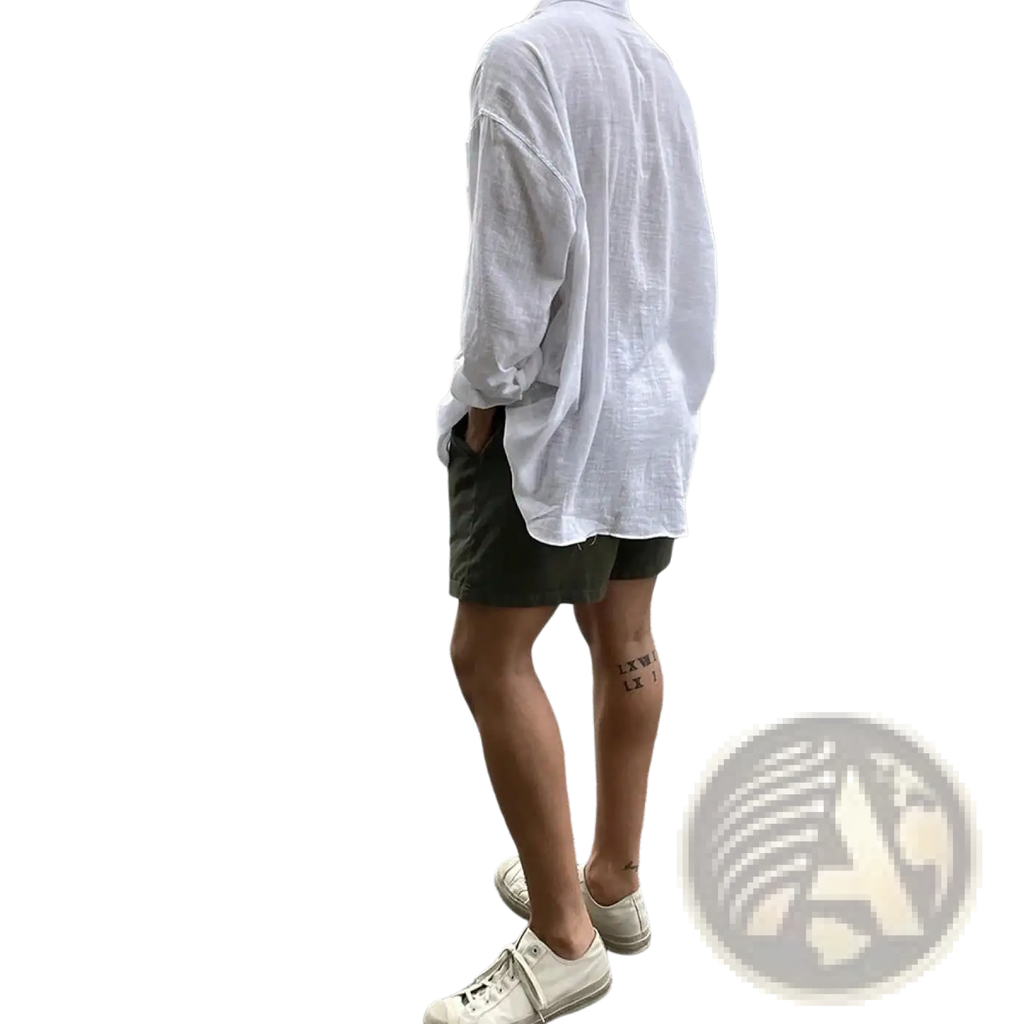 White loose fitting linen button up shirt with rolled sleeves and slightly wrinkled texture korean style