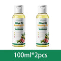 Two 100ml bottles of Kormesic olive rosehip body massage oil with white caps and labels showing green olives and pink roses