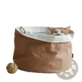 Brown paper pet bed with white interior lining and tan leather handles for dog and cat nesting and storage