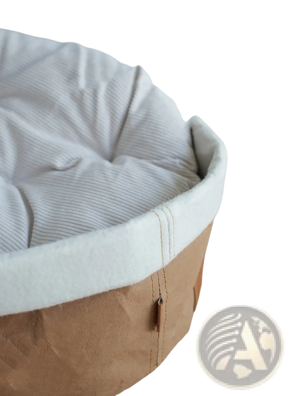 A cozy washable round dog cat nest with a soft white corduroy interior and a brown kraft paper exterior