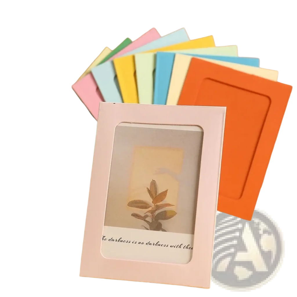 Pastel pink kraft paper photo frame garland with embossed border displaying dried plant on vintage paper for decor