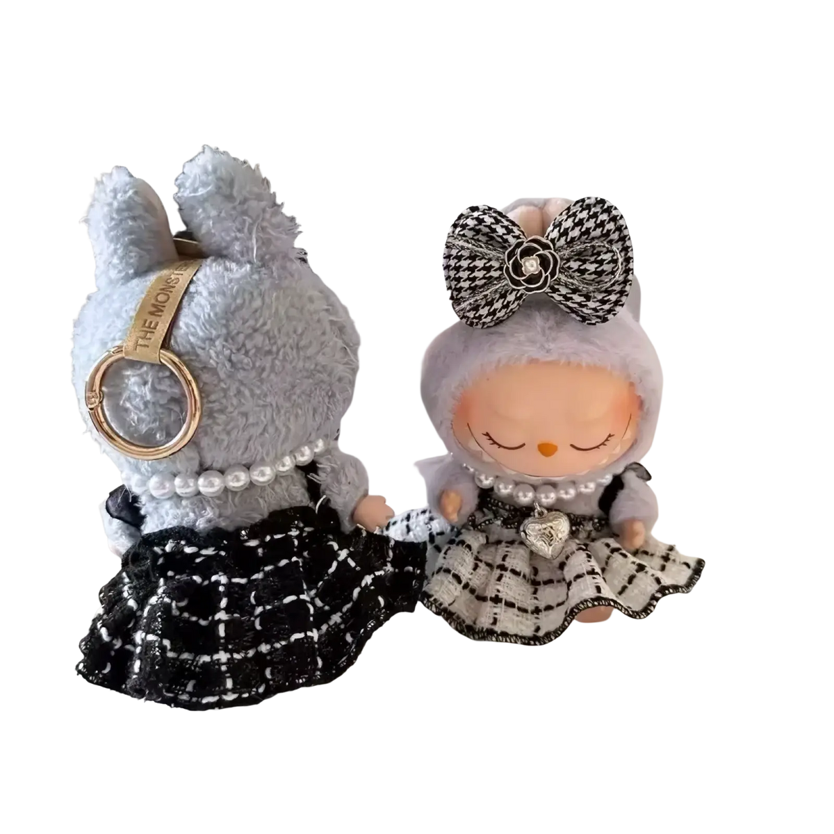 Gray plush bunny keychain wearing labubu black and white plaid doll outfit set with pearl necklace and gold ring