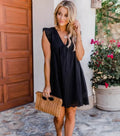 Black eyelet lace jacquard v neck beach dress with scalloped hemline and pockets for casual summer wear
