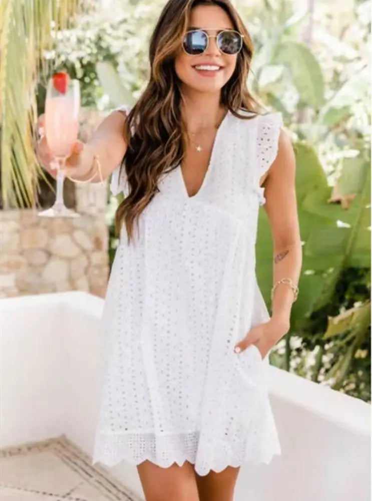 White eyelet lace jacquard v neck beach dress with scalloped hem flutter sleeves and pockets