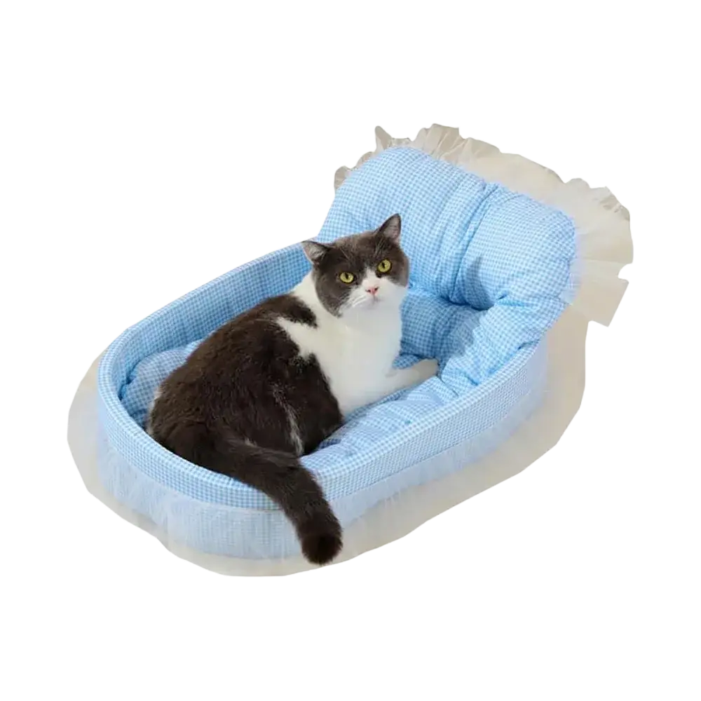 Blue checkered plush cat sofa bed with lace edge and ruffled white trim for comfortable pet lounging