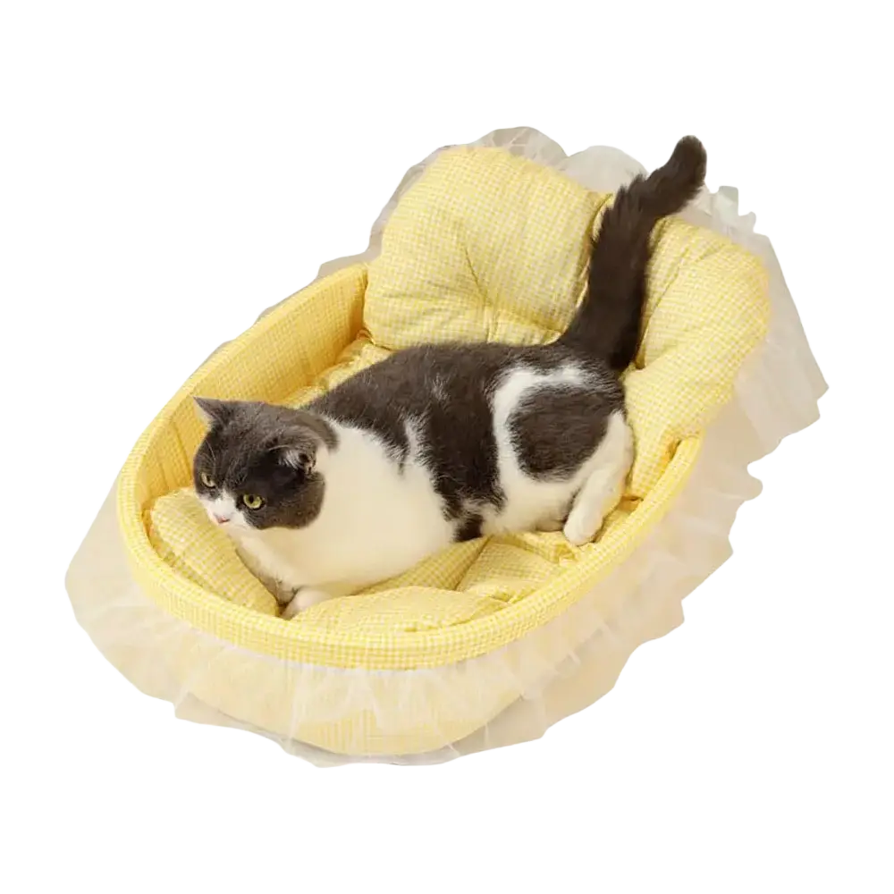 Yellow ruffled cat bed with soft quilted interior and lace edge sheer tulle trim for plush comfort