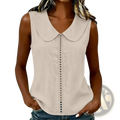 Beige sleeveless top with lace panel and classic peter pan collar detailing on the front placket